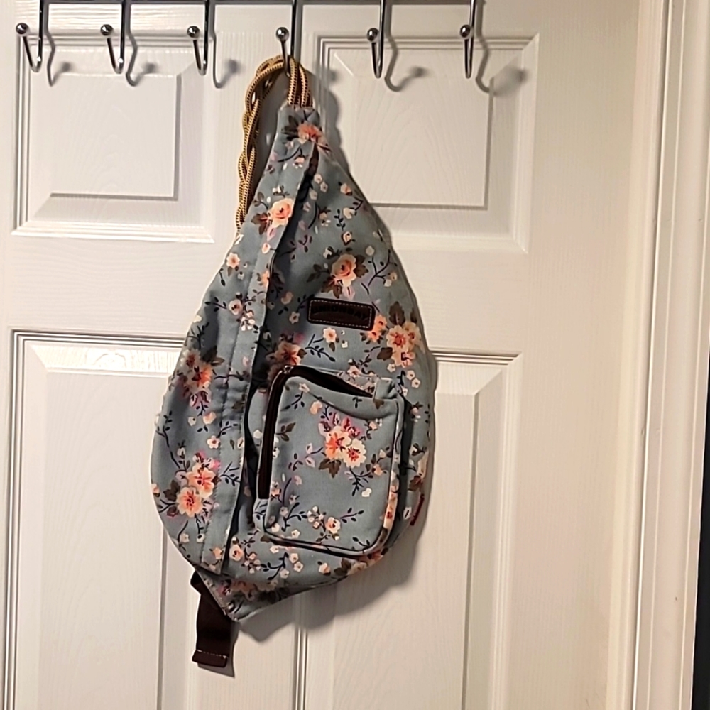 Union bay light blue with floral print cross body bag. 10x18.